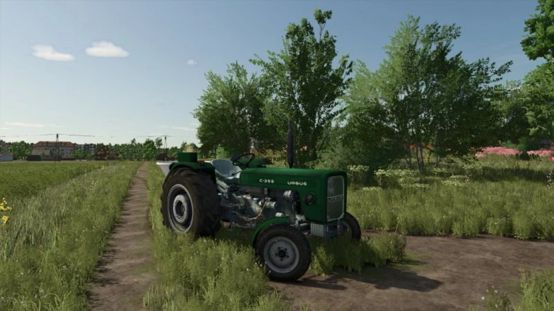 FS25 URSUS C355 ZIELONA mod showcasing a green tractor in a lush field, part of Farming Simulator 25 mods.