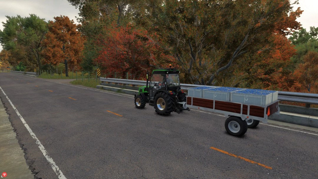 FS25 mod showcasing Vine Hand Harvest Trailer on a road with autumn trees in Farming Simulator 25.