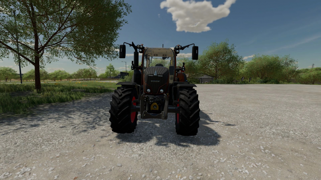 Fendt Vario 700 Municipal mod in FS22, displayed on a sunny farm with trees in the background.