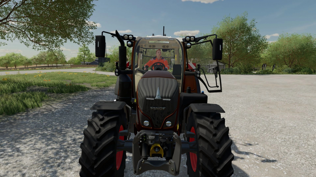 FS22 Fendt Vario 700 Municipal v1.2.0.0 mod, front view of tractor in a rural setting.