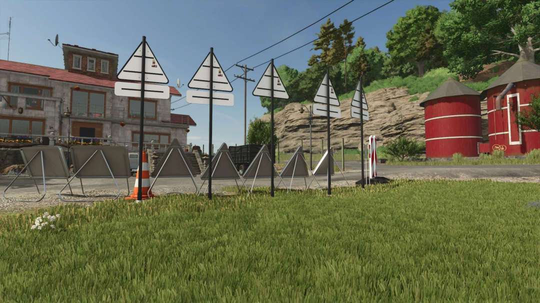 French Temporary Signs mod for FS25 depicting caution signs near a road with a house and trees in the background.