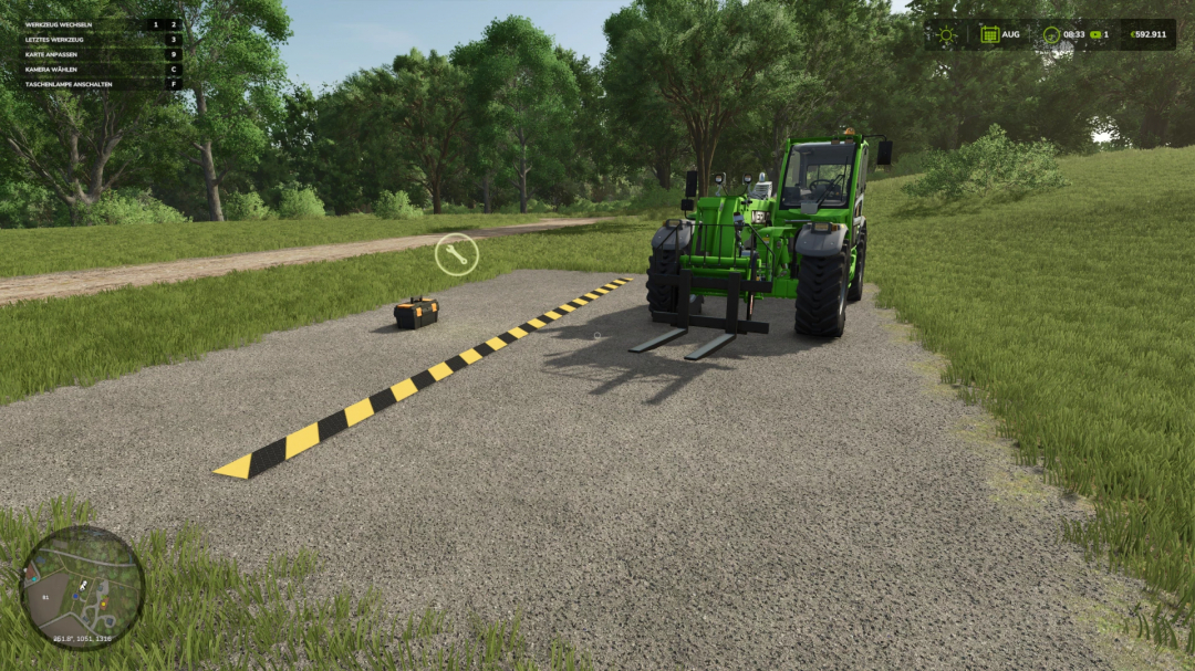 FS22 mod HoT Workshop v1.0.0.0 showing a green tractor on a paved area with a tool box and yellow-black markers.