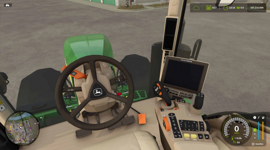 Vista interior del tractor John Deere 7R en el mod FS25, mostrando el volante y los controles del tablero.