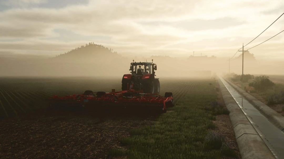 FS25 mods: Kuhn Prolander 7500 in a misty field during sunset in Farming Simulator 25.