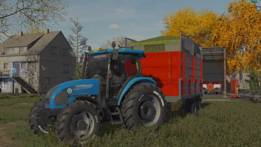 Landini PowerFarm tractor mod for FS22 next to trailer on farm by house, showcasing Farming Simulator 22 mods.