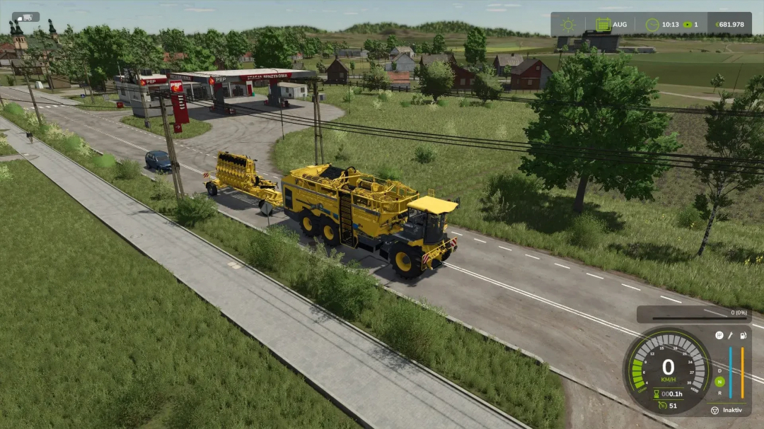 Multifruit ROPA mod v1.0.0.1 in FS25, harvesting equipment moving through a rural landscape.