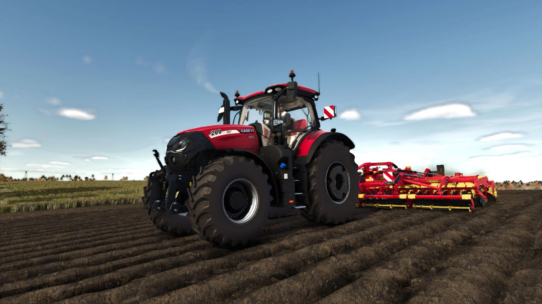 FS25 mods Shader v1.0.0.0: Red tractor with equipment on plowed field under clear sky in Farming Simulator 25.