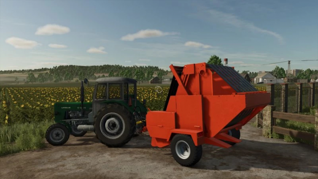 FS25 mod Sipma Z263 trailer attached to a green tractor on a farm, showcasing rural landscape.