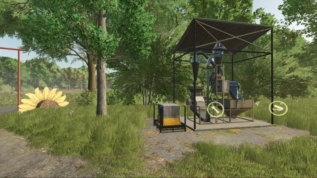 Small Seed Factory mod in FS25, situated in a lush green area, featuring farm machinery under a covered structure.