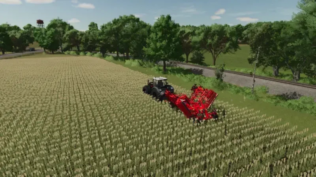 FS25 mod: TAIFUN 900 RP58 Plow working in a field in Farming Simulator 25.