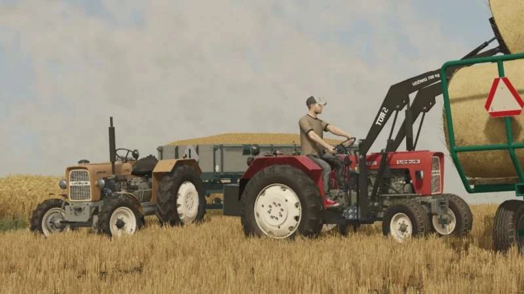 FS22 mods - Ursus C330 4x2/4x4 tractors in wheat field, showcasing Farming Simulator 22 mod features.