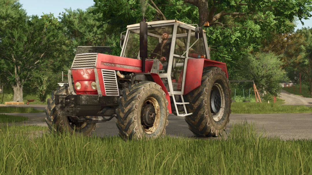 Tractor Zetor Crystal 16045 en el mod FS25, con neumáticos robustos, estacionado en un campo de hierba.