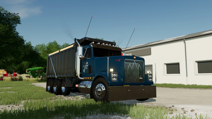 fs22-mods,  1988 International 9300 truck in FS22 mod, parked on grass by building, clear sky.