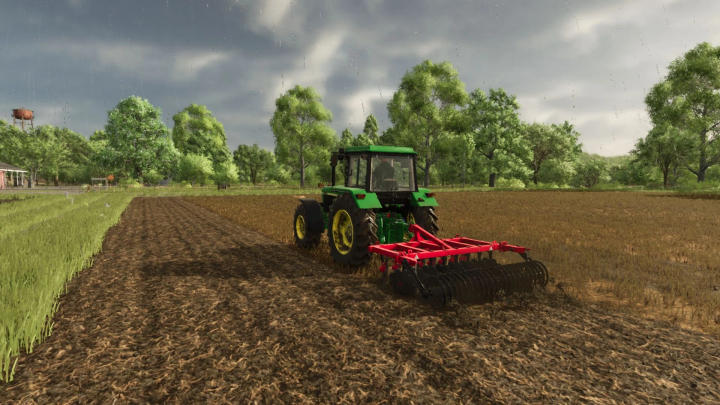 fs25-mods,  A tractor with ABD 2.6x2 mod in FS25 plowing a field under rainy skies.