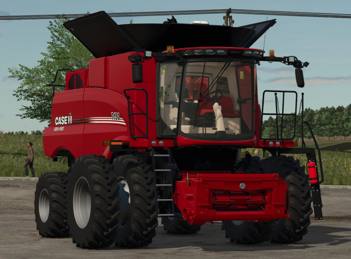 fs25-mods,  FS25 mod Axial-Flow 7150 Edit v1.0.0.0 mostrando una mietitrebbia rossa con grandi pneumatici in Farming Simulator 25.