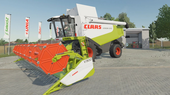 fs22-mods, FS22 mod Claas Lexion 500 Series combine harvester in a farm setting, showcasing its green and white design.