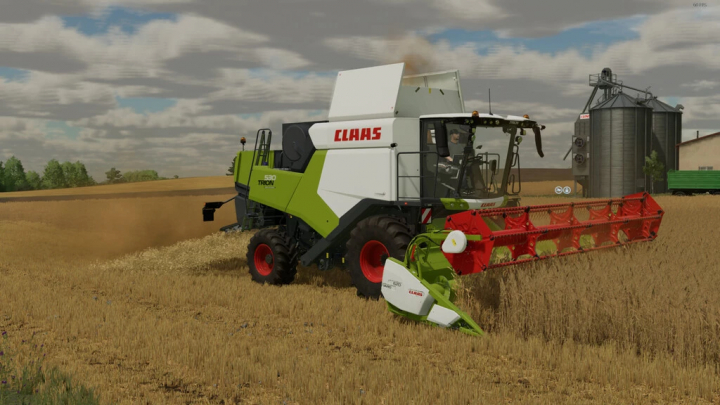 fs22-mods,  Claas Trion 530-660 harvesting wheat in FS22 mod pack. Farming Simulator 22 mods enhance gameplay with realistic machinery.