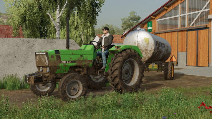 fs22-mods,  FS22 mods: Deutz-Fahr DX3 Series tractor pulling a water tank trailer near a barn in Farming Simulator 22.