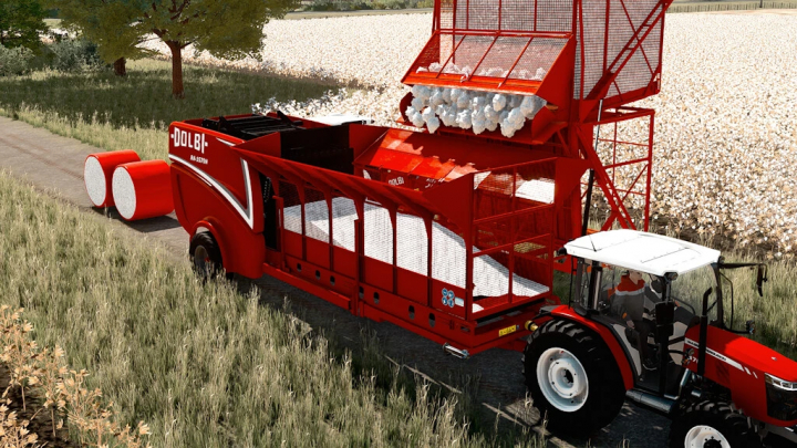 fs22-mods,  Dolbi RA1570 mod in FS22, a red cotton harvester on a farm field with a tractor.