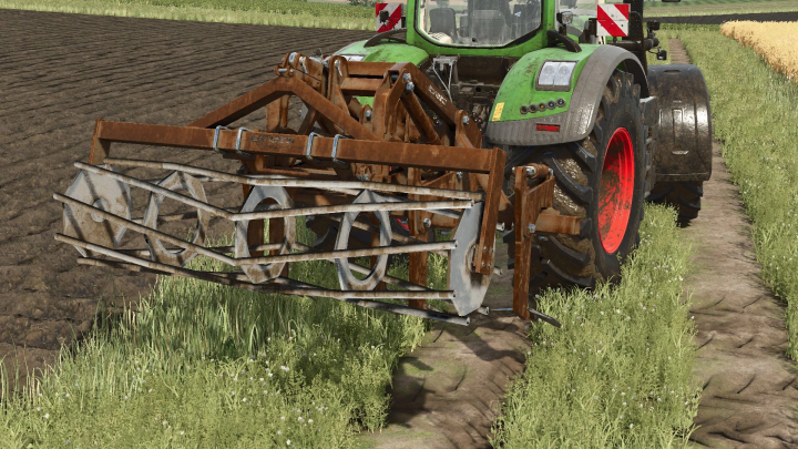 fs25-mods,  Evers Trakehner mod for FS25 shown attached to a tractor, ready for fieldwork in Farming Simulator 25.