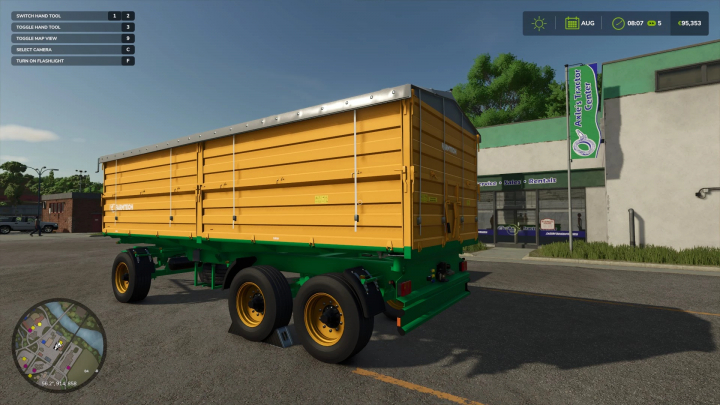 fs25-mods,  Farmtech Pack trailer in FS25 at Axle's Tractor Center, featuring a yellow and green design, part of Farming Simulator 25 mods.