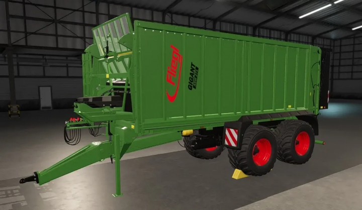 fs25-mods,  Fliegl Gigant color selection mod for FS25, showcasing a green trailer in a warehouse.