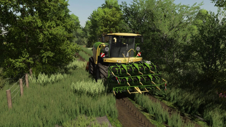 fs22-mods,  The Krone Big X 680-1180 mod in FS22 showcased in a grassy field, ideal for Farming Simulator 22.