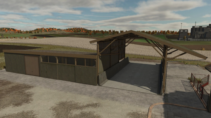 fs25-mods,  Old Barn With Shelter mod for FS25, showcasing a rustic structure with open front and side barn, set against a rural landscape.