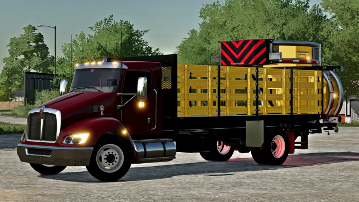 fs22-mods,  TSC Kenworth Traffic Truck mod in FS22 with red cab and yellow cargo area parked on a rural road.