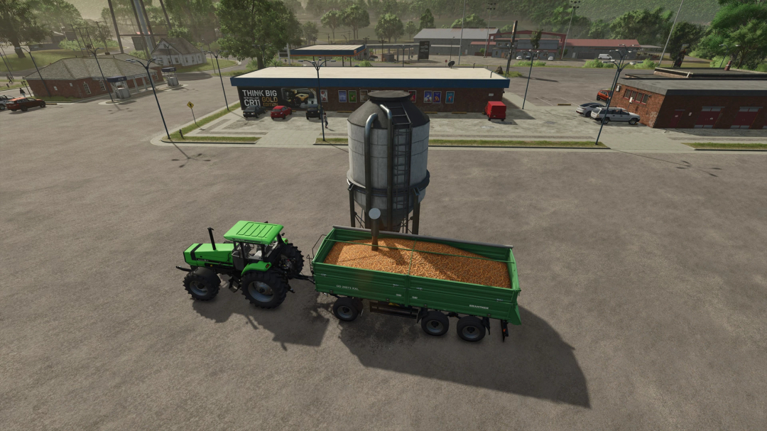 FS25 mod: Tractor loading grain at -10% off Wholesale Buying Station By CW33.