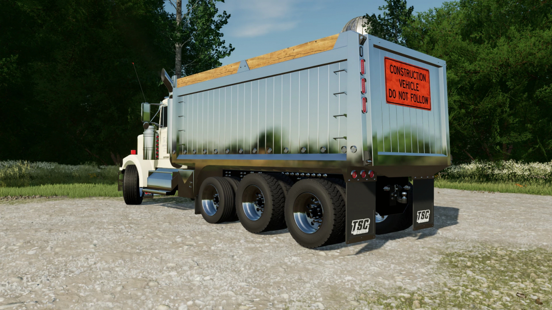 FS22 mod: 1990 Western Star 4964 Tri-Axle truck with construction warning sign, parked on gravel in Farming Simulator 22.