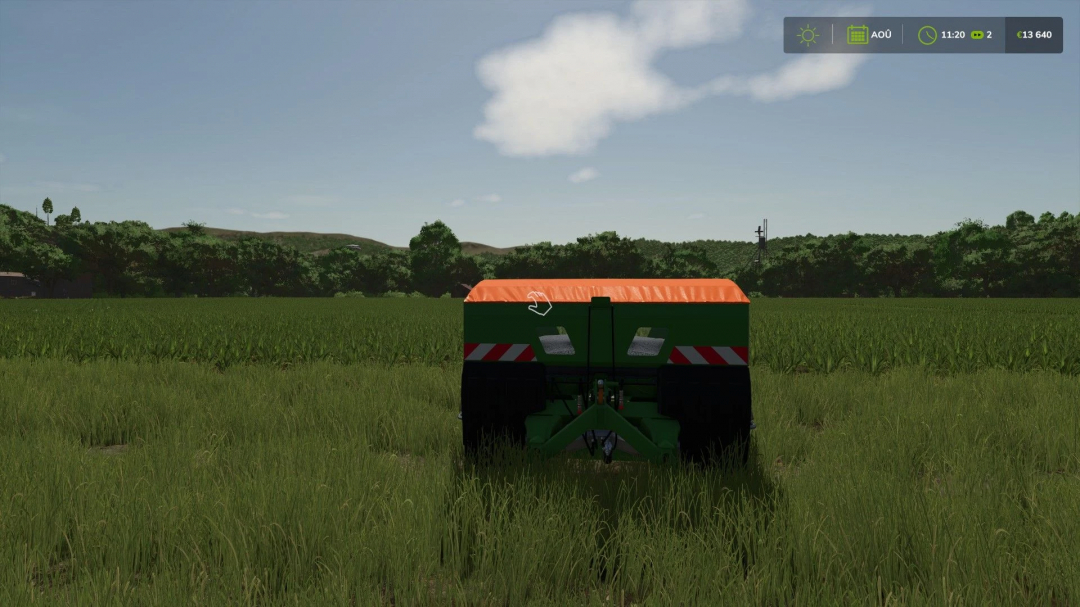 Amazone ZA-TS 3200 mod in een grasveld in FS25