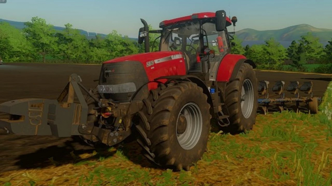 FS22 mods Case IH Pack v1.0.0.0 com um trator vermelho em um campo no Farming Simulator 22.