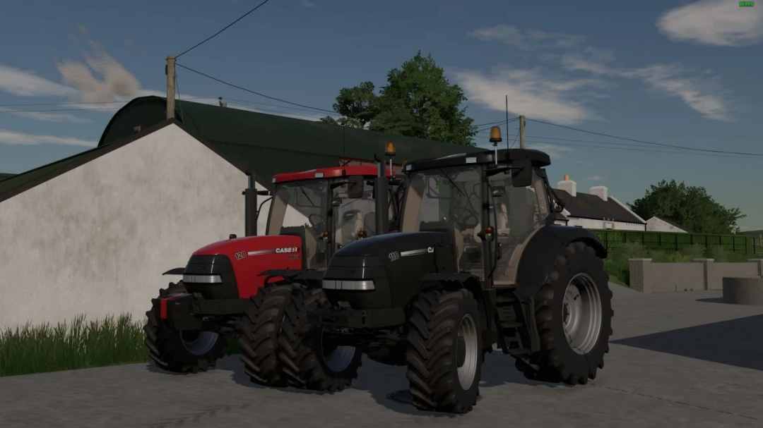 FS22 mods Case IH Pack v1.0.0.0 mostrando dois tratores em uma fazenda no Farming Simulator 22.