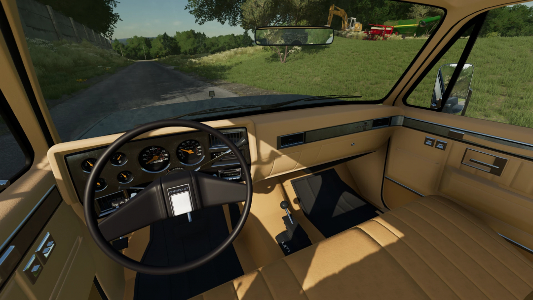 FS22 mod Chevrolet K30 Dually interior showcasing steering wheel and dashboard in Farming Simulator 22.