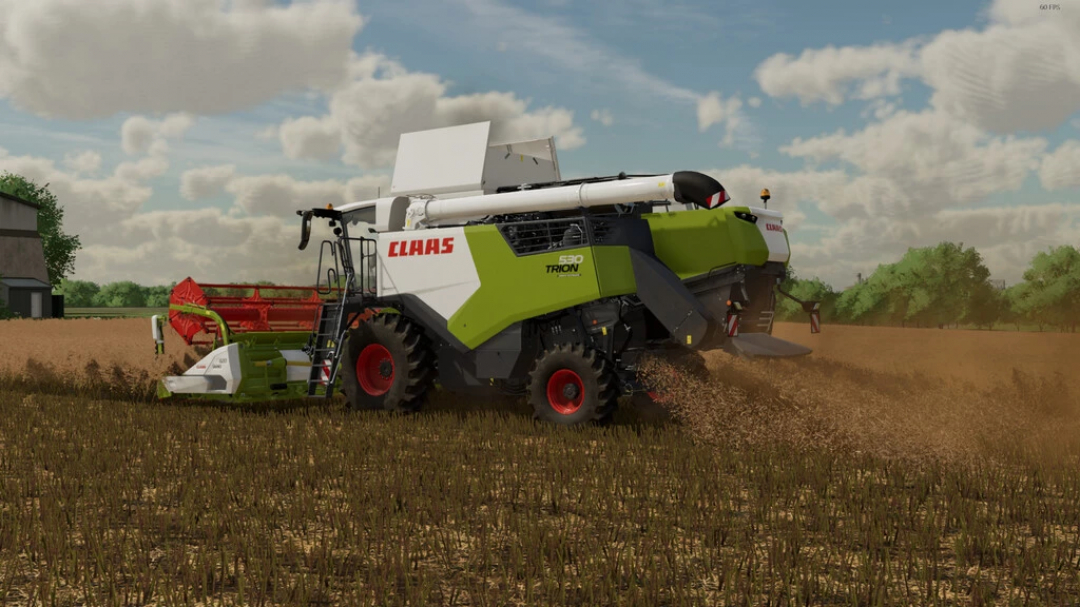 Claas Trion 530 harvester in FS22 mod, working in a field under a cloudy sky.