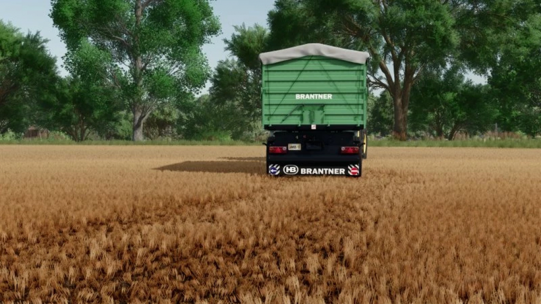 FS25 Pressed stubble v2.0.0.0 mod showcasing a Brantner trailer on a stubbly field in Farming Simulator 25.