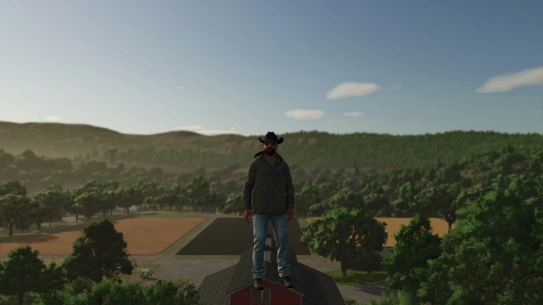 Personaggio sul tetto del fienile nel mod FS25 Farming Essentials v1.0.0.0 con vista panoramica.