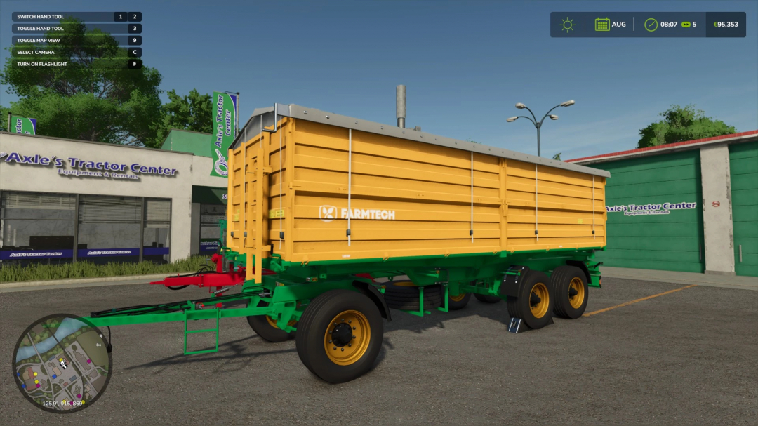 Mod FS25 Farmtech Pack exibindo reboque amarelo no Axle's Tractor Center.