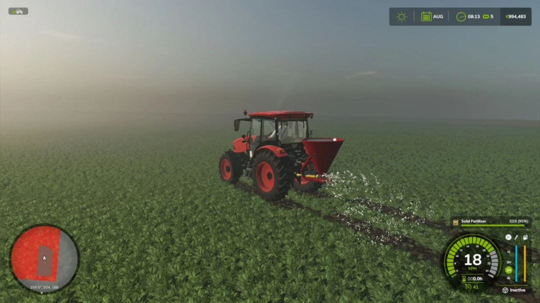 FS25-mod IMT Ciklon v1.0.0.0, rode tractor verspreidt mest op een groen veld bij zonsopgang in Farming Simulator 25.