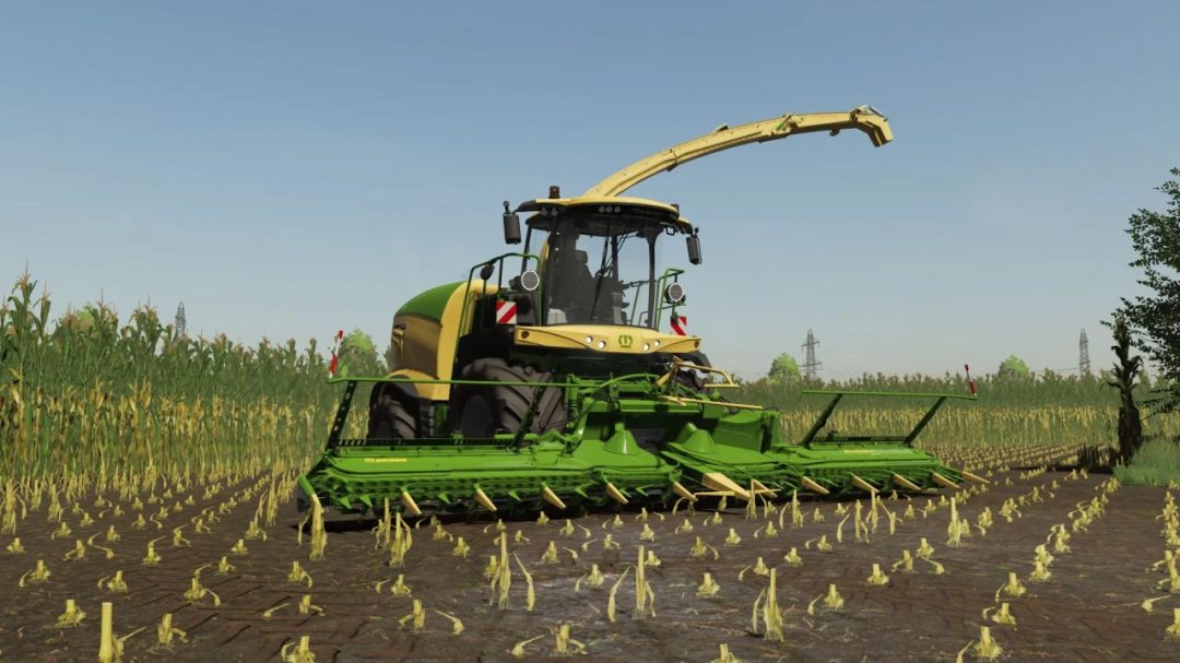 Kombajn Krone Big X 680-1180 w FS22, tnący kukurydzę na polu, pokazuje mody do Farming Simulator 22.