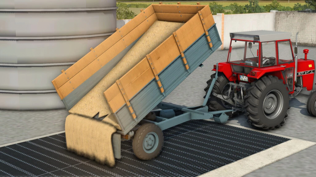 FS22 mods: Lizard Loznica 5T trailer unloading grain, attached to a red tractor in Farming Simulator 22.