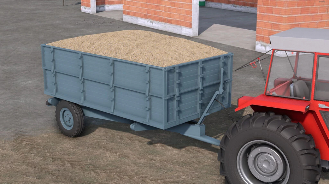 FS22 mods: Lizard Loznica 5T trailer loaded with grain, attached to a red tractor in Farming Simulator 22.