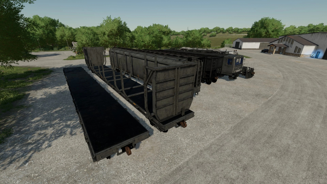 FS22 Lizard Train Pack v1.0.0.0 mod pokazujący wagony kolejowe w wiejskim otoczeniu, część modyfikacji Farming Simulator 22.