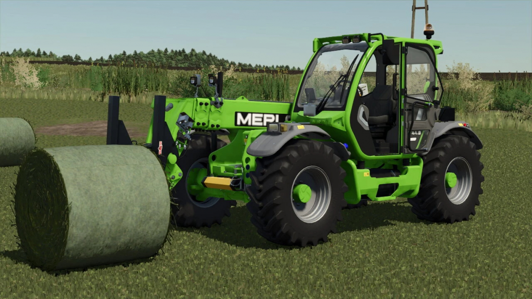 Mod Merlo Multifarmer 449 dans FS25, avec télescopique vert sur champ herbeux.