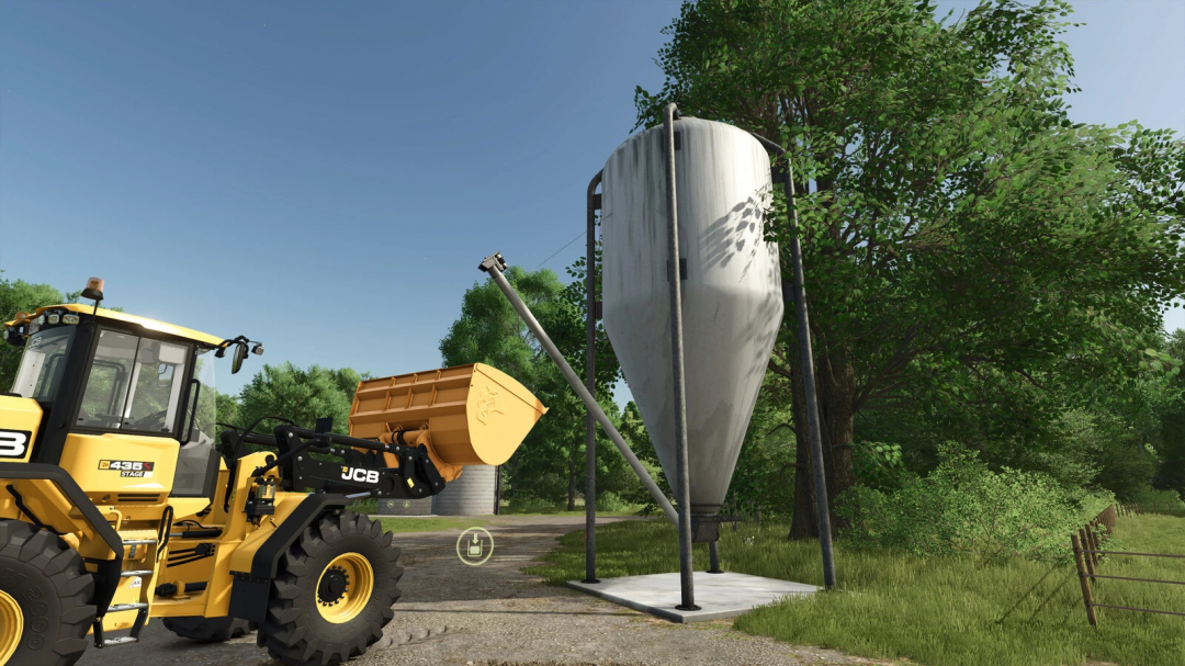 FS25 Mineralzellsilo-Mod mit gelbem Lader in Bauernumgebung, Farming Simulator 25.