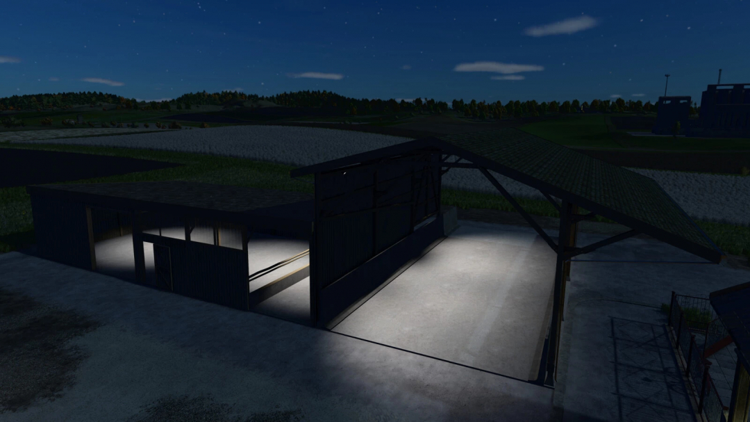 Vista notturna del mod Old Barn With Shelter per Farming Simulator 25, con architettura rustica illuminata.