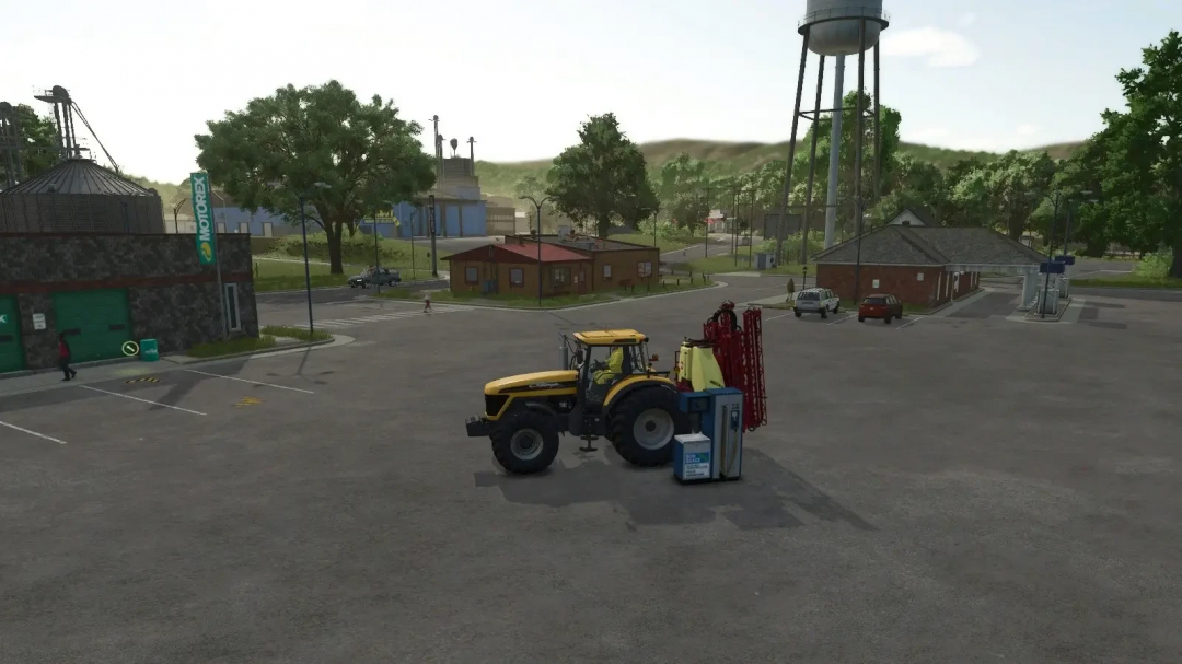 Yellow tractor using Pump For Silage Additive mod in FS25, near silos and trees.