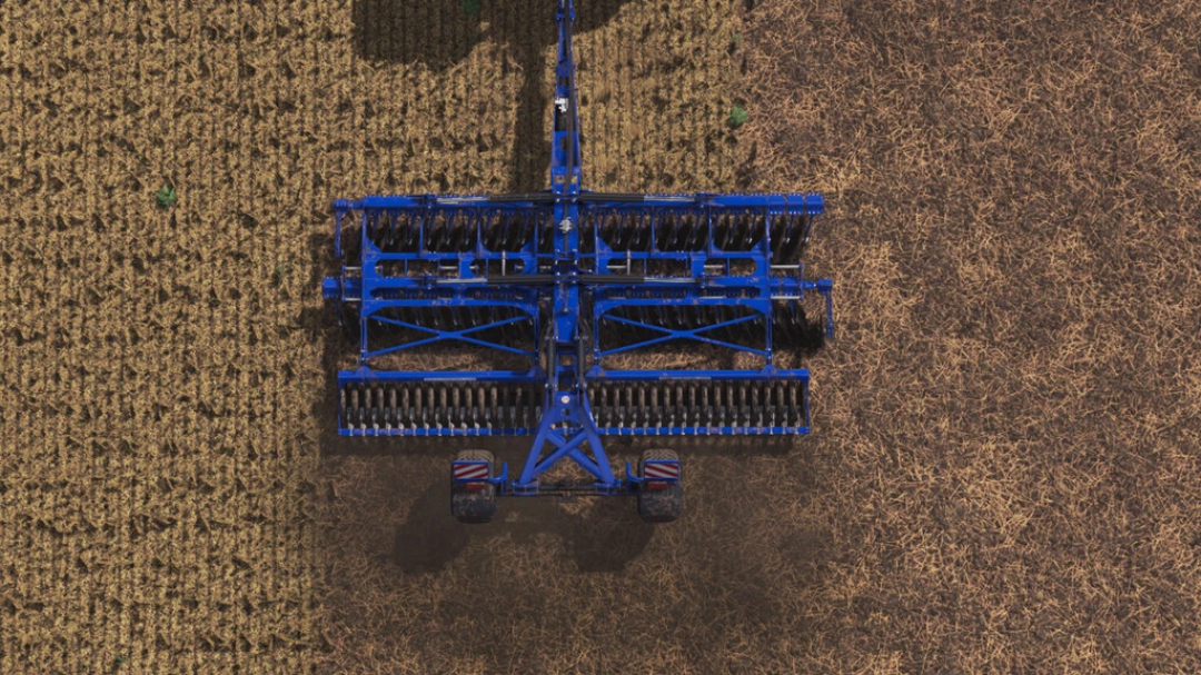 Top view of Rolmako U671 Standard v1.0.2.0 mod in FS22, showing a blue agricultural machine on a field.