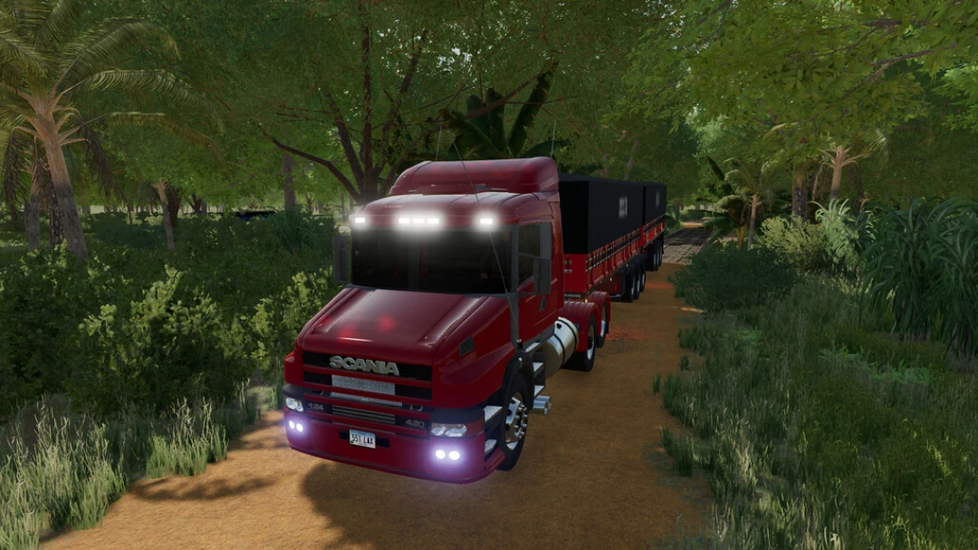 Mod de camión Scania RJL en FS22 en un camino forestal, diseño rojo y negro.